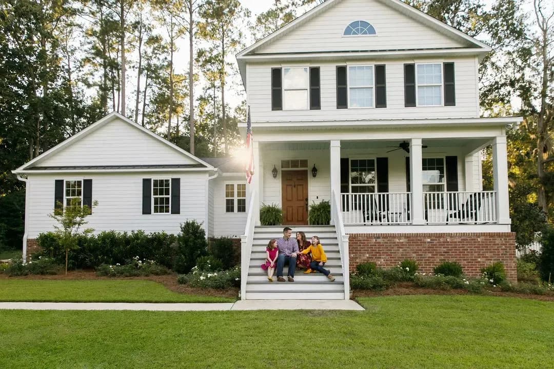 Family in Front of Home